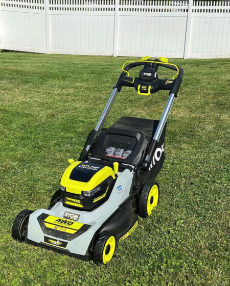RYOBI on the lawn cutting